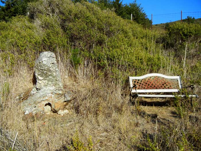 Alan Chadwick's gravestone and memorial bench at Zen farm